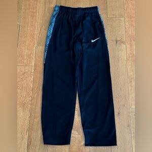 Nike Dri-Fit boys black sweatpants size medium with pockets.